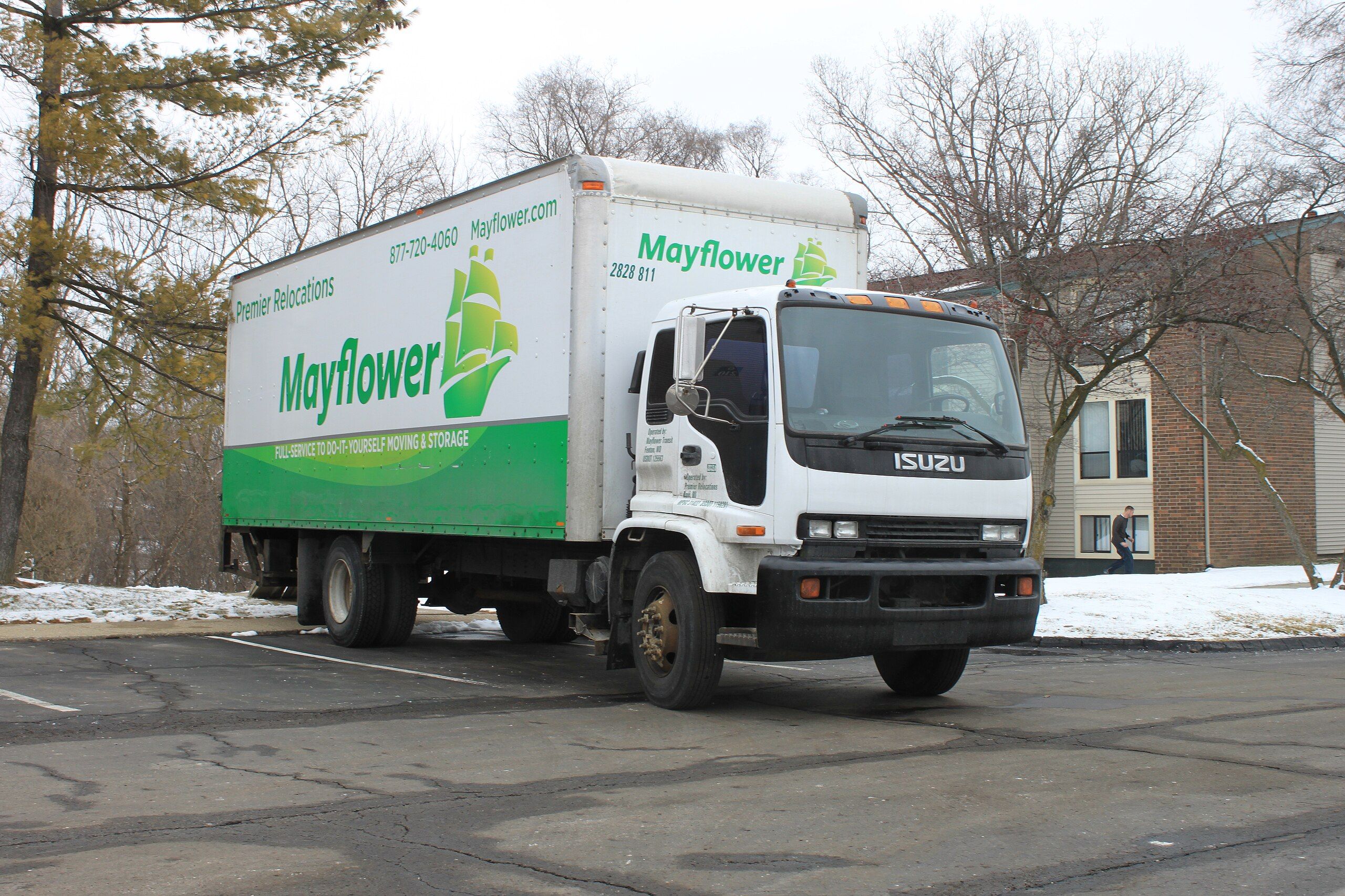 mayflower moving truck outside a building